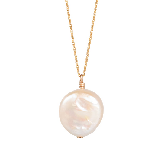 a necklace with a white pearl on a gold chain
