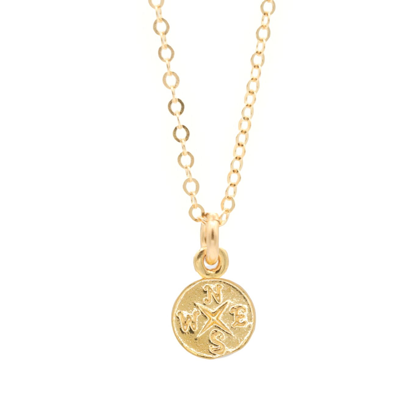 a gold necklace with a coin on a chain