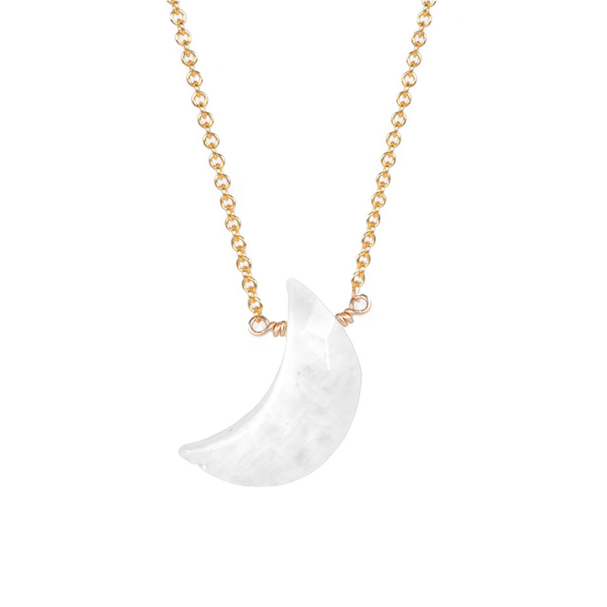 a necklace with a white moon on a gold chain