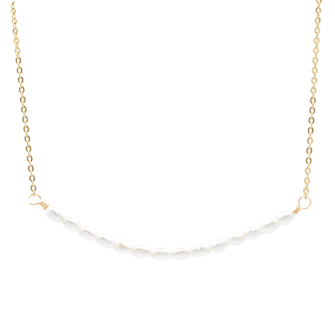 a gold chain with white pearls on it