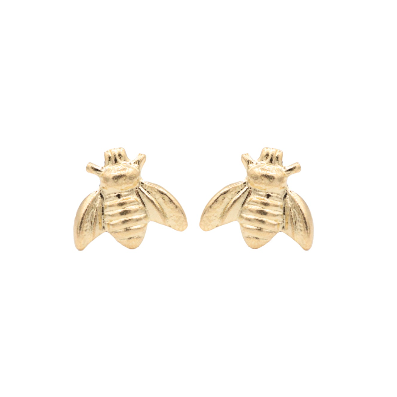 a pair of gold earrings with a bee on it
