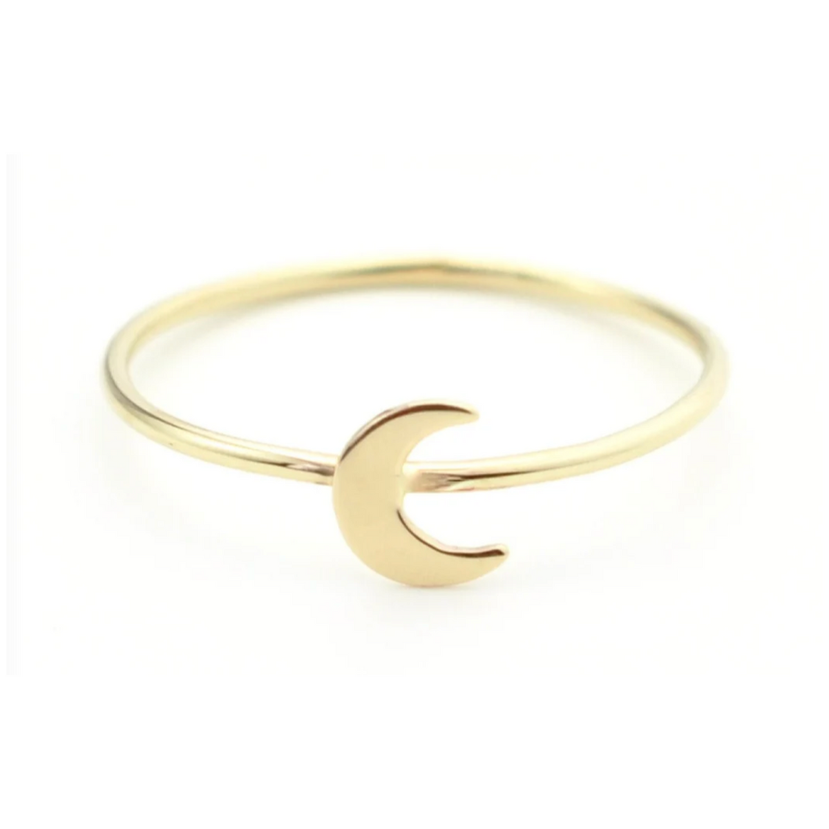 a gold ring with a crescent on it