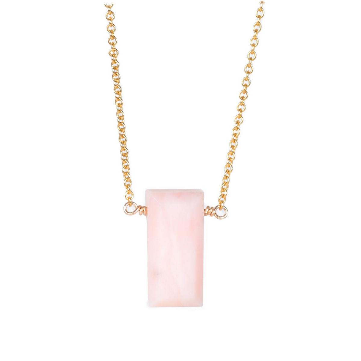 a necklace with a pink stone on a gold chain