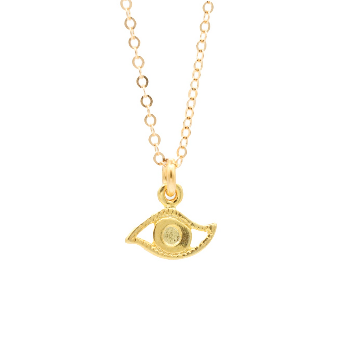 a gold necklace with an evil eye on it