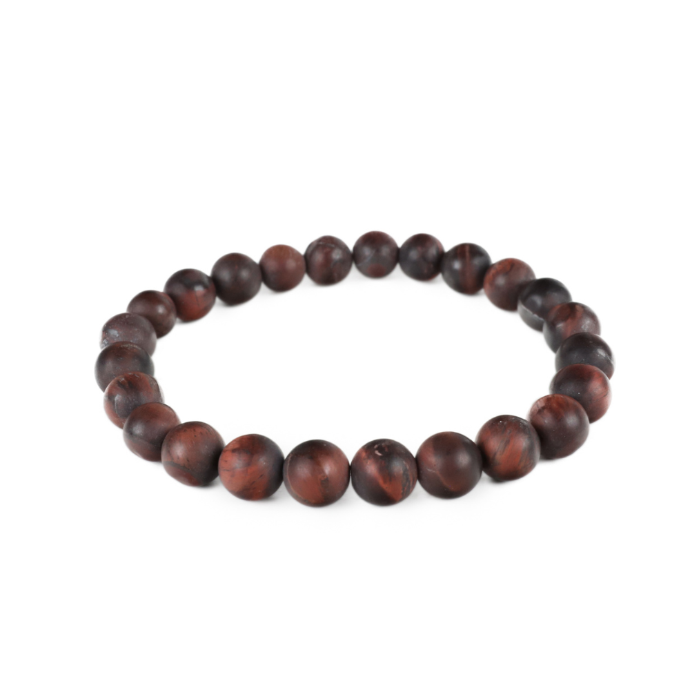 a bracelet made of wood beads on a white background