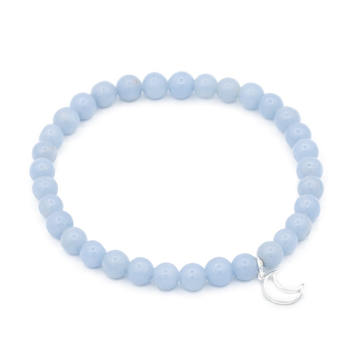 a bracelet with a crescent charm on a white background