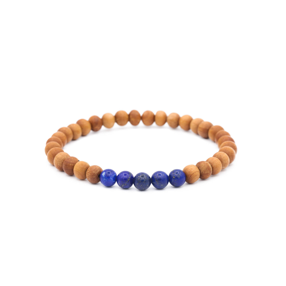 a wooden bracelet with blue beads