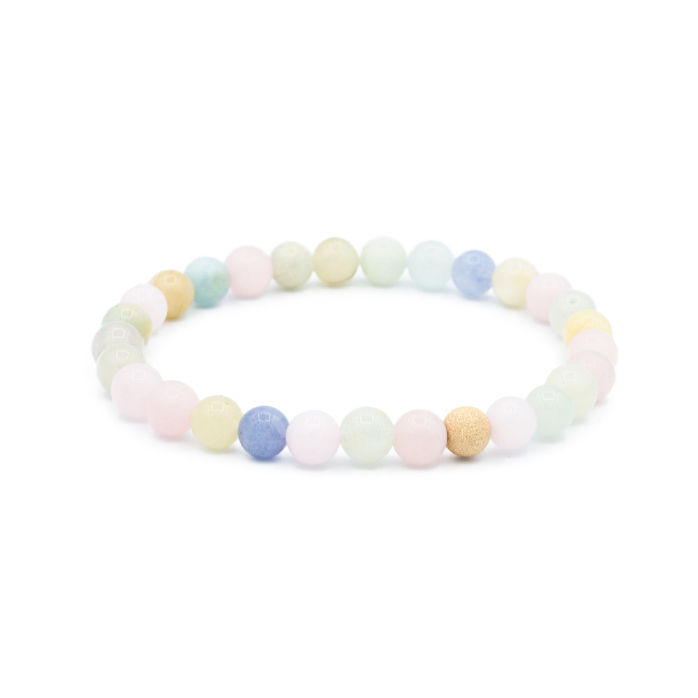 a white bracelet with multicolored beads